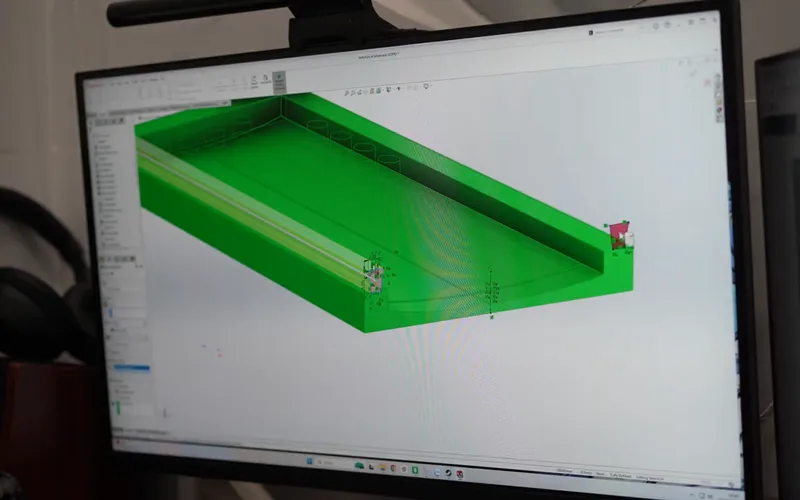 Mô hình CAD màu xanh lá của hộp có rãnh trượt